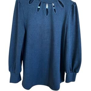 Women’s M-L sweater, key hole cutouts around neck in front.  Black